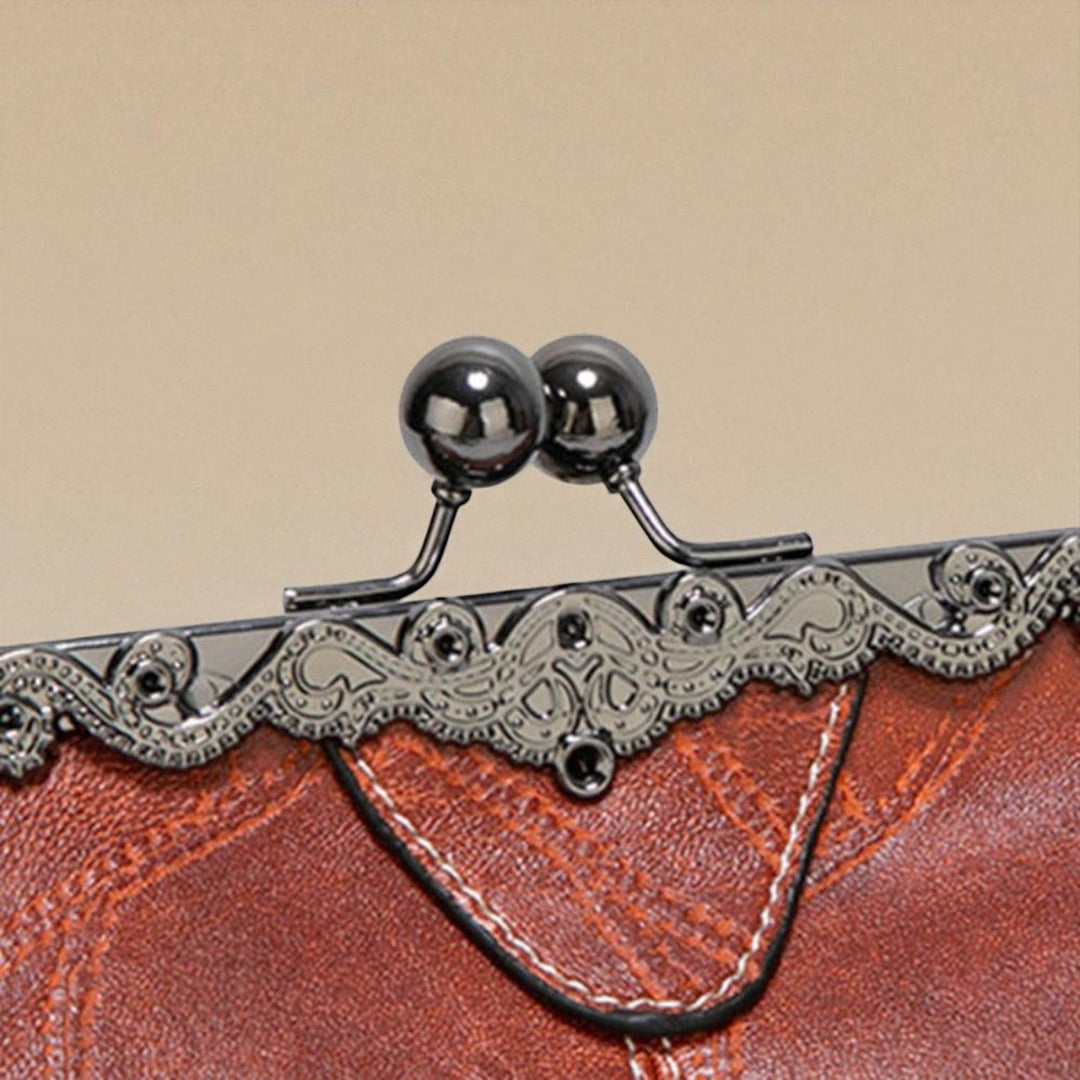 Geantă vintage cu închidere tip "kiss-lock"