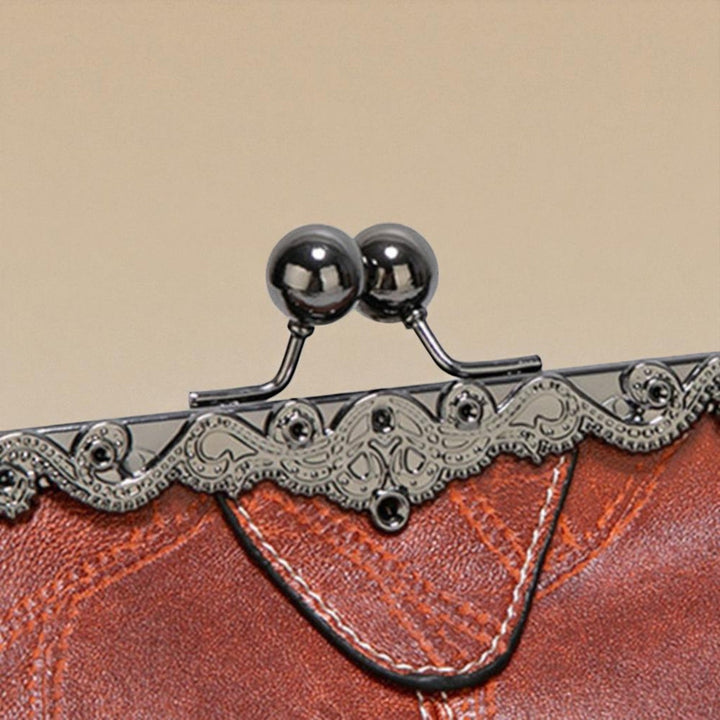 Geantă vintage cu închidere tip "kiss-lock"